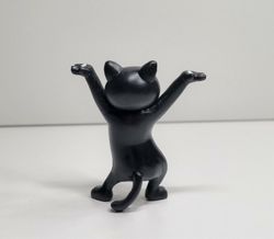 Dansande katt, katt med uppsträckta tassar. Figurin (svart)