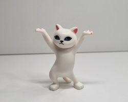 Dansande katt, katt med uppsträckta tassar. Figurin (vit)