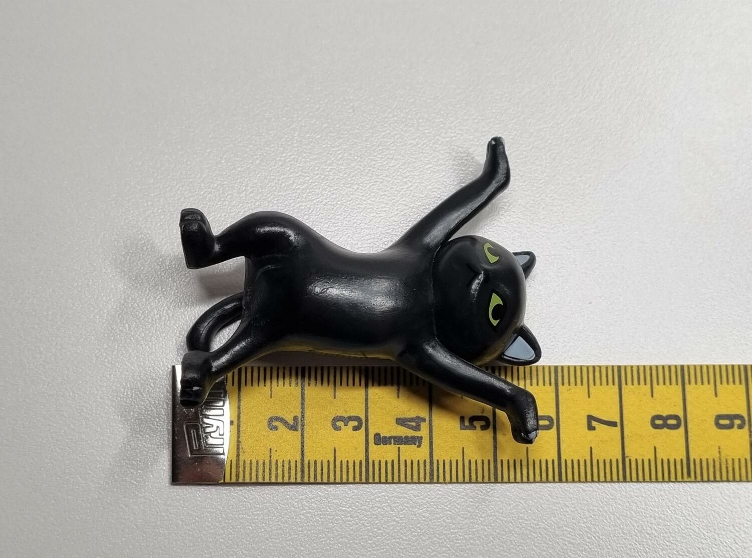 Dansande katt, katt med uppsträckta tassar. Figurin (svart)