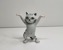 Dansande katt, katt med uppsträckta tassar. Figurin (grå)