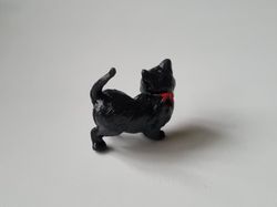 Svart katt på sin vakt / miniatyr