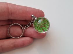 Nyckelring med rund glasberlock (grön)