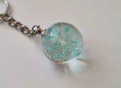 Nyckelring med rund glasberlock (ljusturkos)