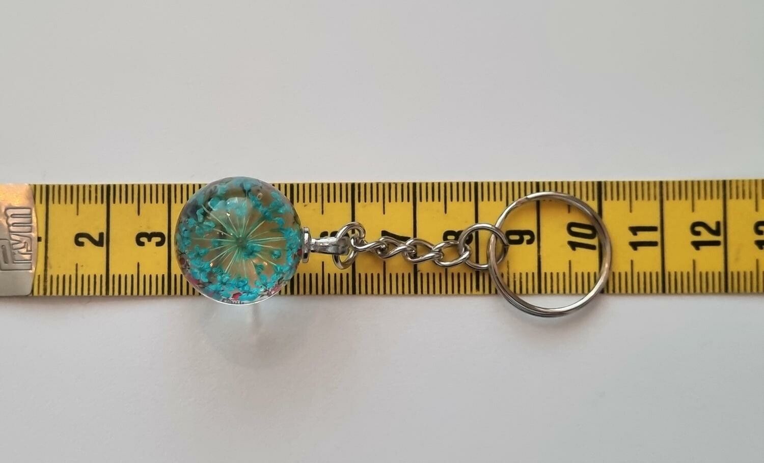 Nyckelring med rund glasberlock (turkos)