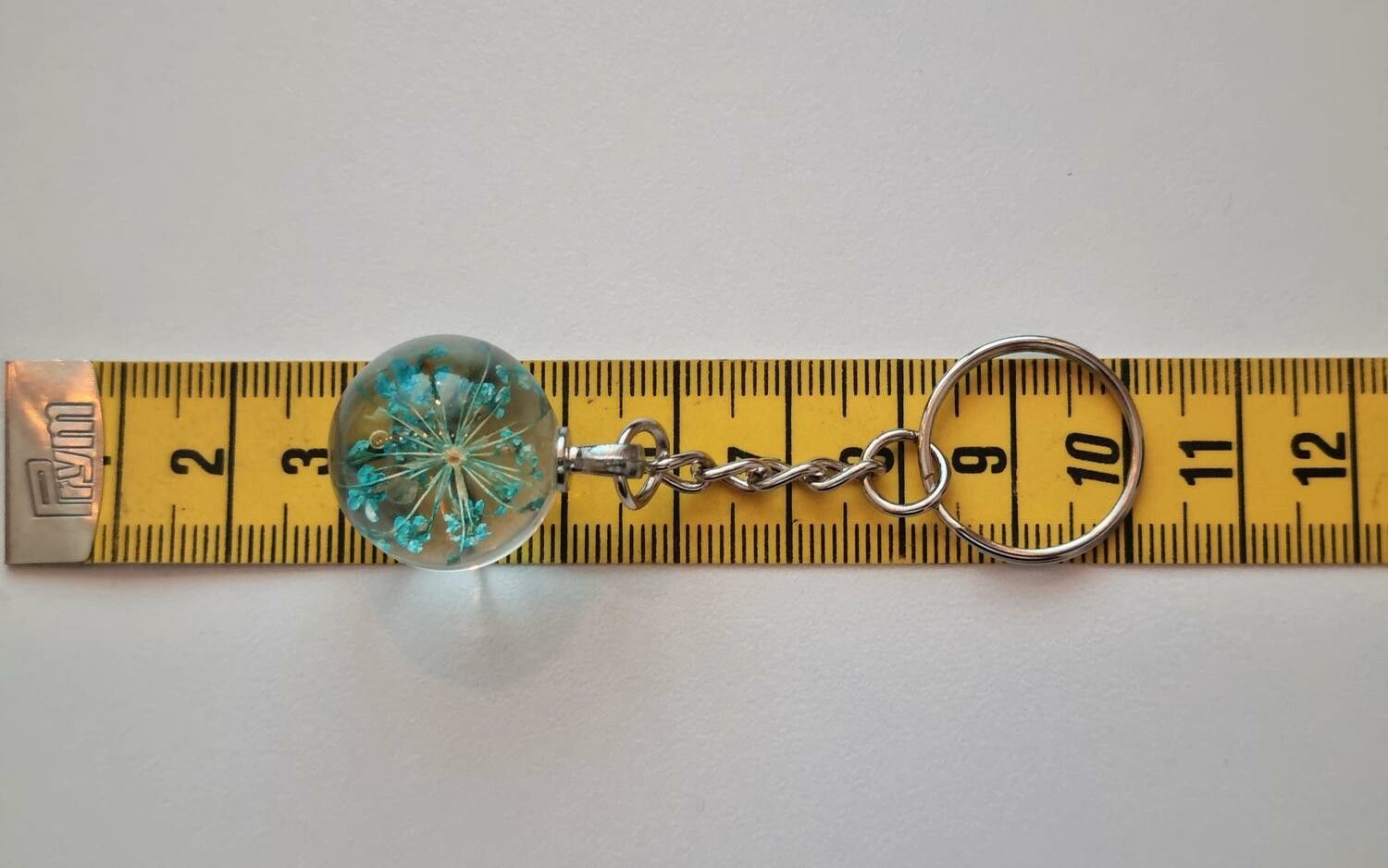 Nyckelring med rund glasberlock (turkos)