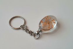 Nyckelring med oval glasberlock (orange)