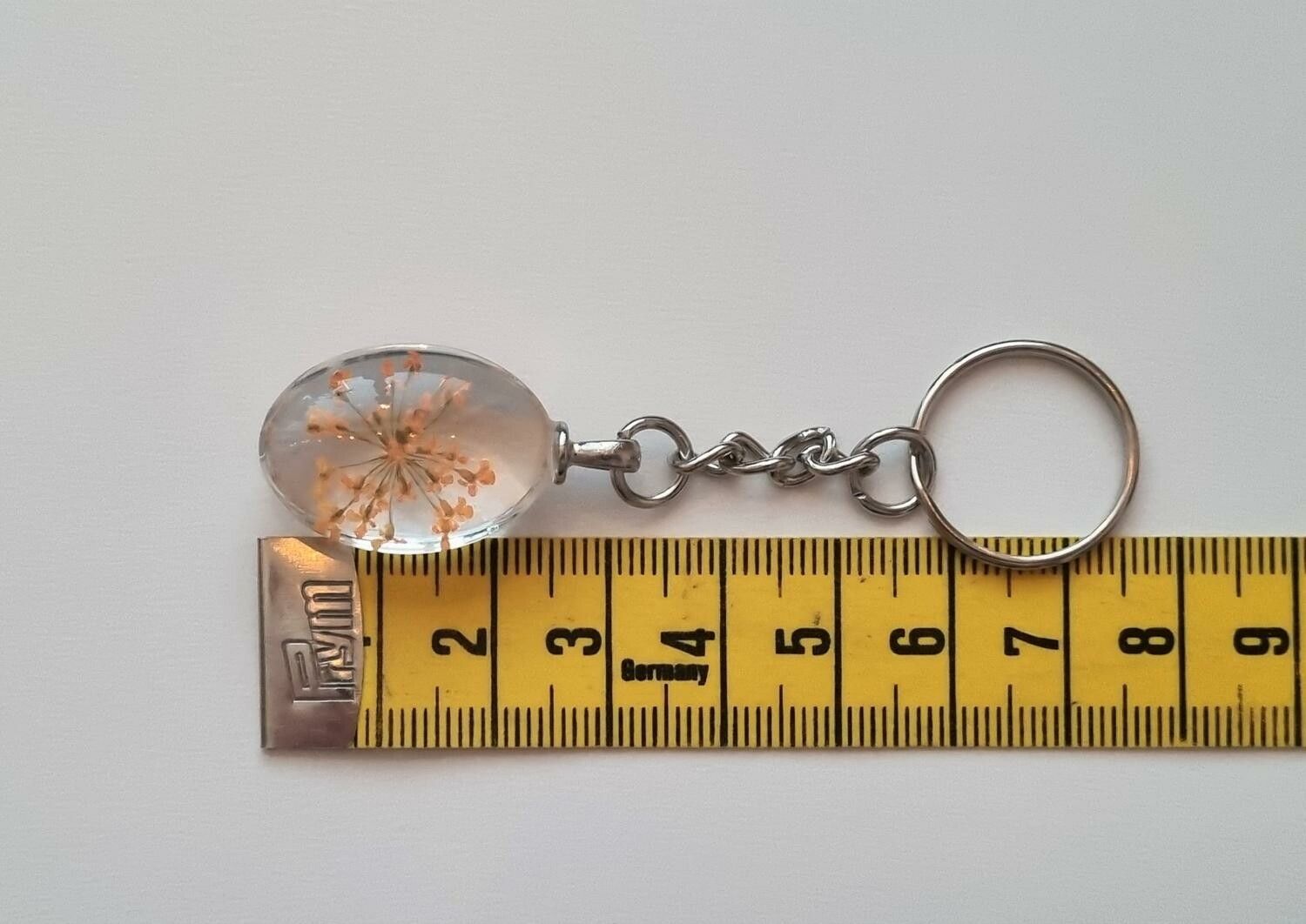Nyckelring med oval glasberlock (orange)