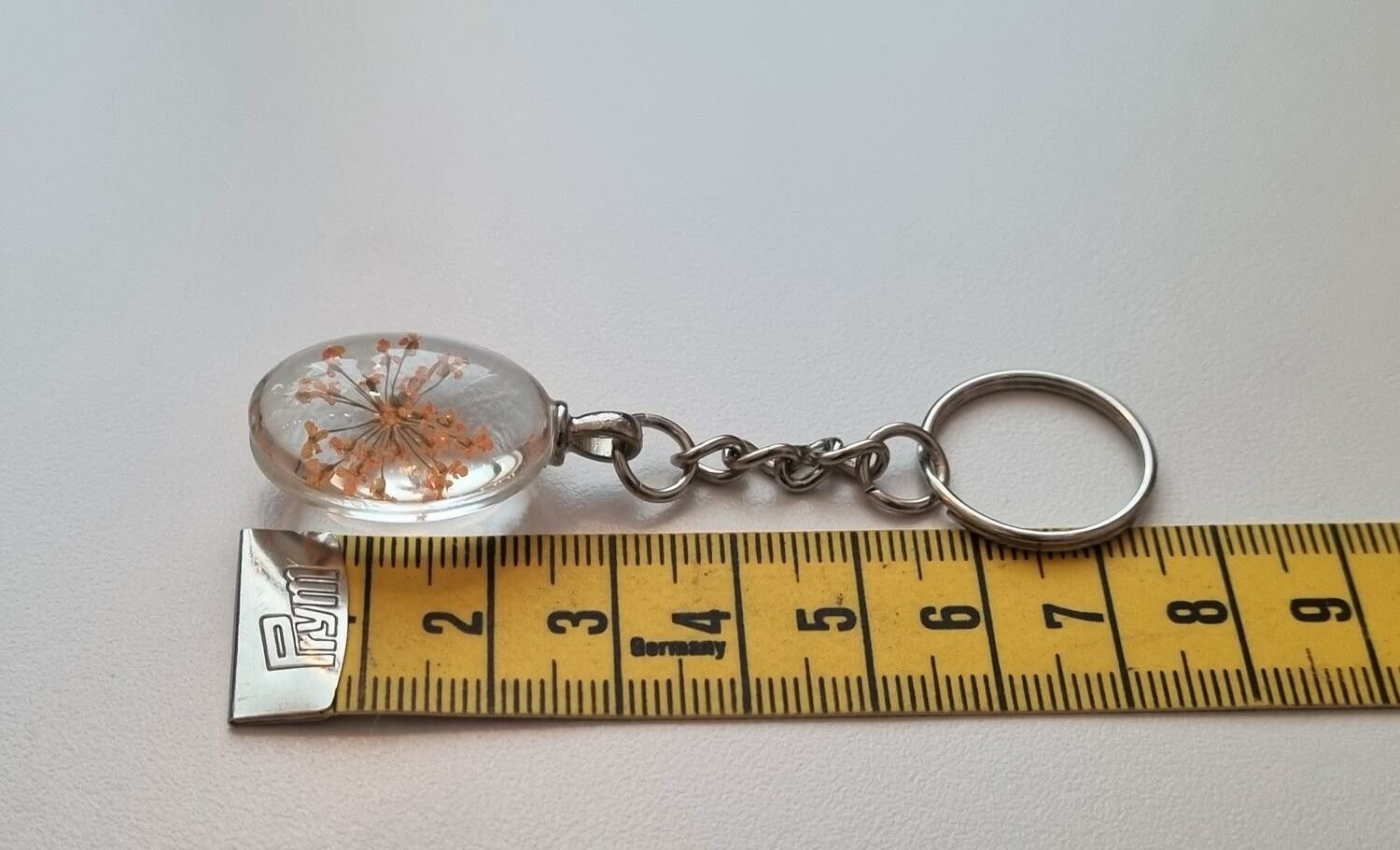 Nyckelring med oval glasberlock (orange)