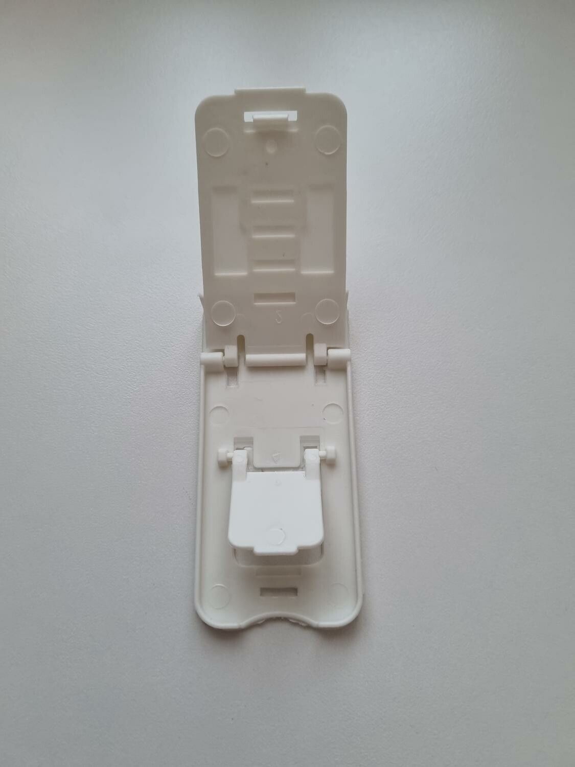 Liten hopfällbar mobilhållare (vit)