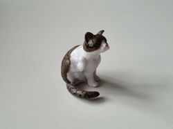 Katt som kliar sig / miniatyr