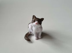 Katt som kliar sig / miniatyr