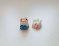 2 st små delfiner. Miniatyrer / figuriner för dockskåpet, tittskåp mm