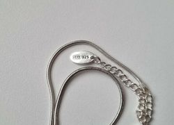 Halsband i sterling 925 med liten berlock