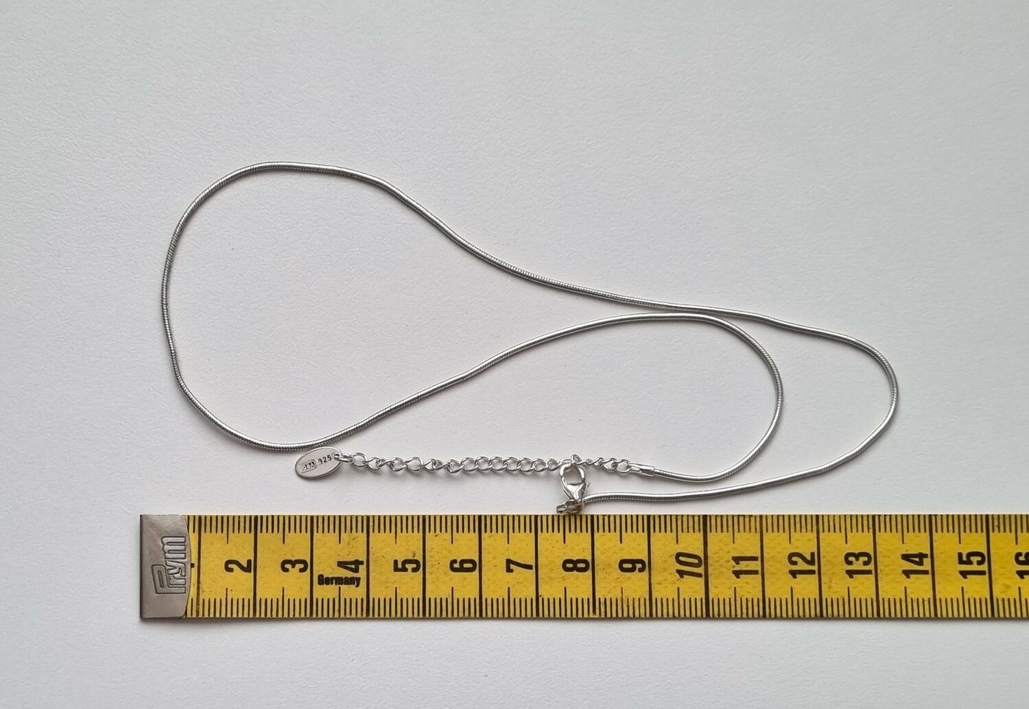 Halsband i sterling 925 med liten berlock