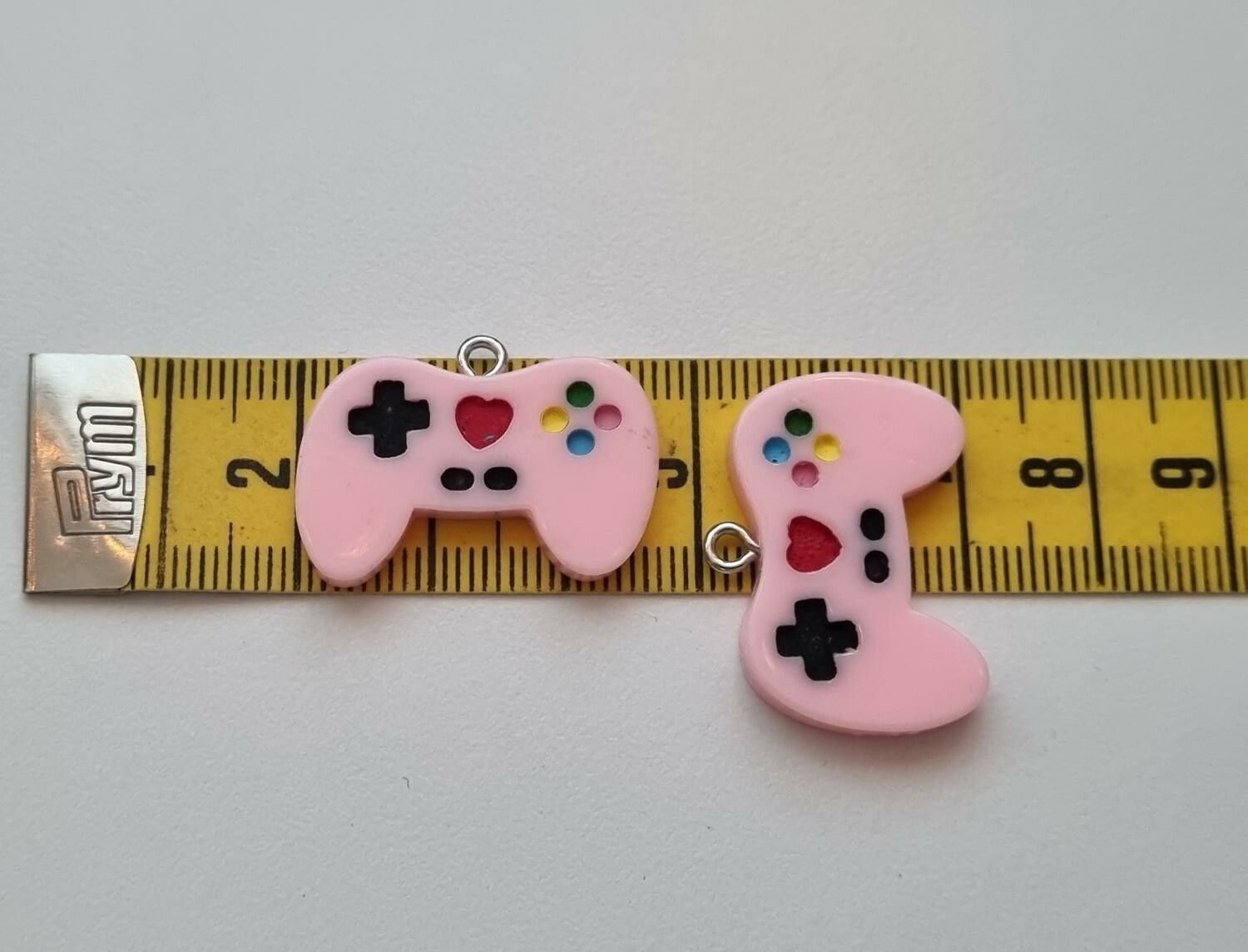 2 st Berlocker Handkontroller, hängen miniatyrer (rosa)