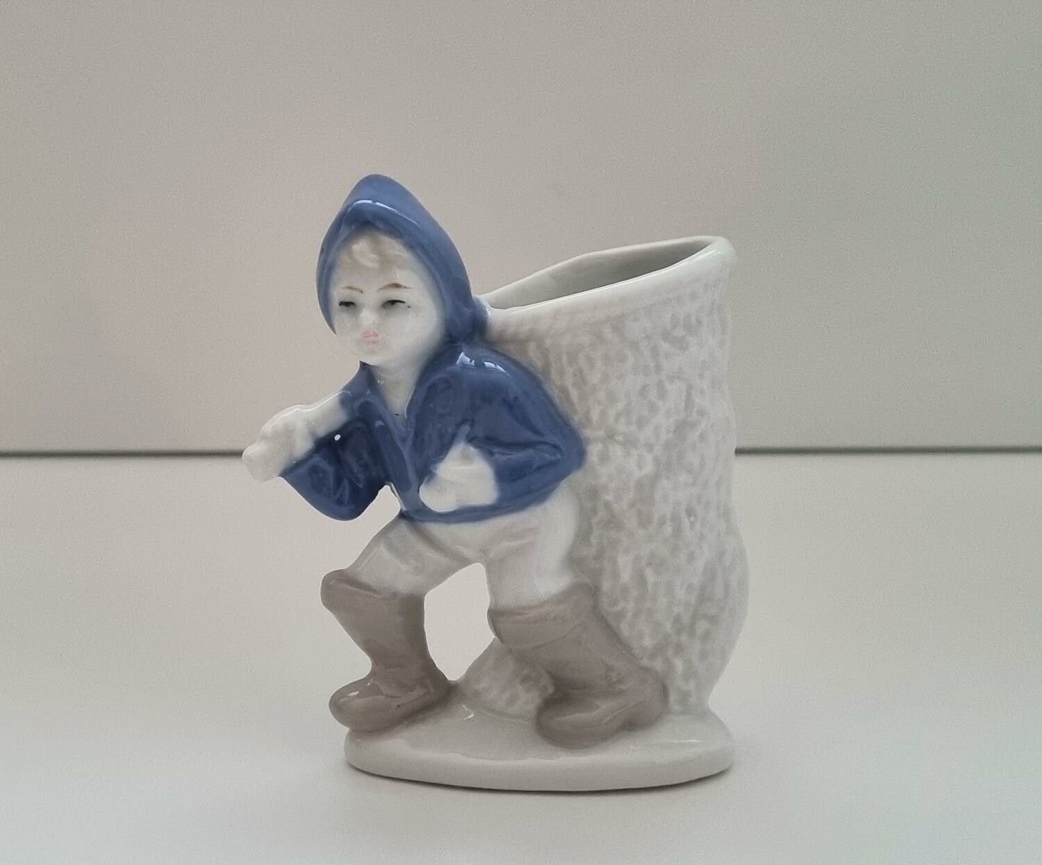 Figurin, pojke med stor håv