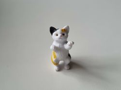 Gullig katt som står på sina tassar / miniatyr