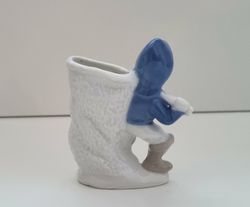 Figurin, pojke med stor håv