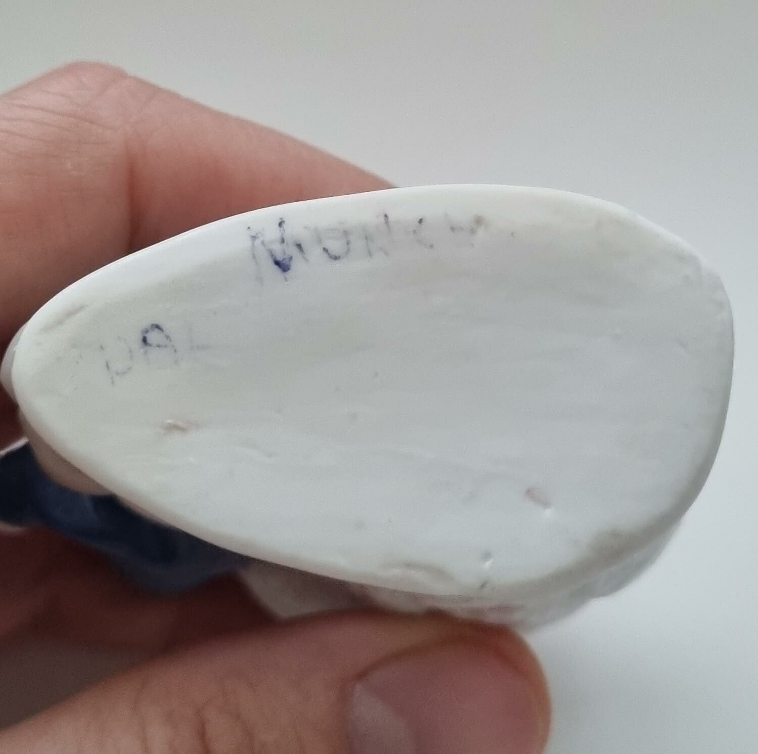 Figurin, pojke med stor håv
