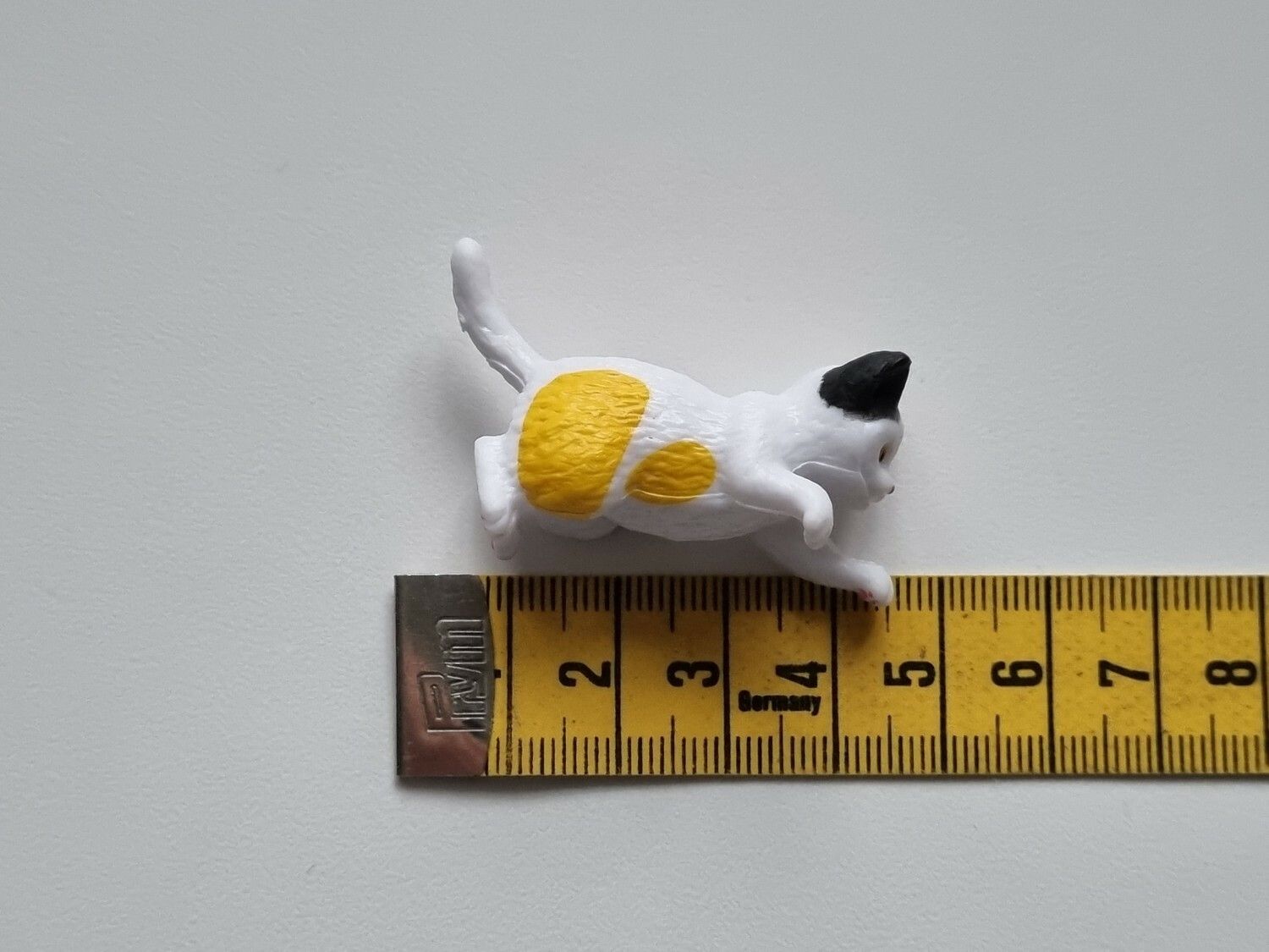 Gullig katt som står på sina tassar / miniatyr