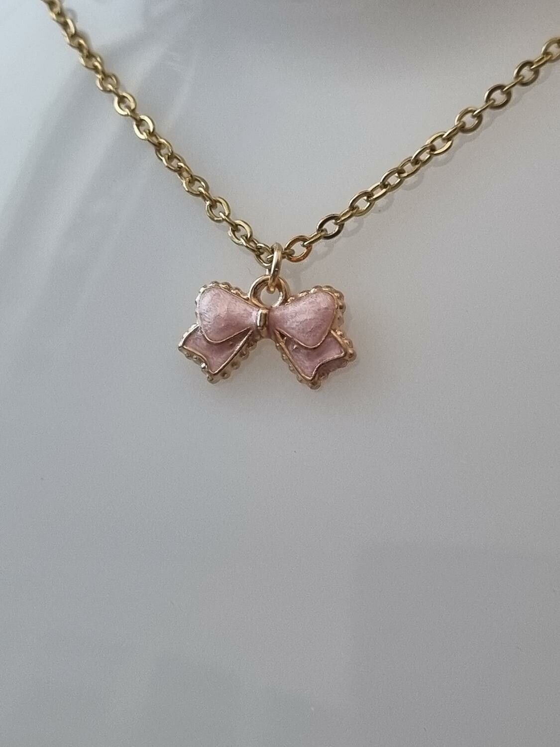 Halsband med rosa rosett (50 cm lång kedja i rostfritt stål)