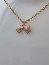 Halsband med rosa rosett (50 cm lång kedja i rostfritt stål)