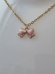 Halsband med rosa rosett (50 cm lång kedja i rostfritt stål)