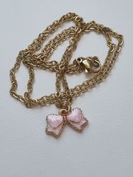 Halsband med rosa rosett (50 cm lång kedja i rostfritt stål)