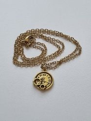 Halsband med klockberlock i steampunk (45 cm långt halsband)
