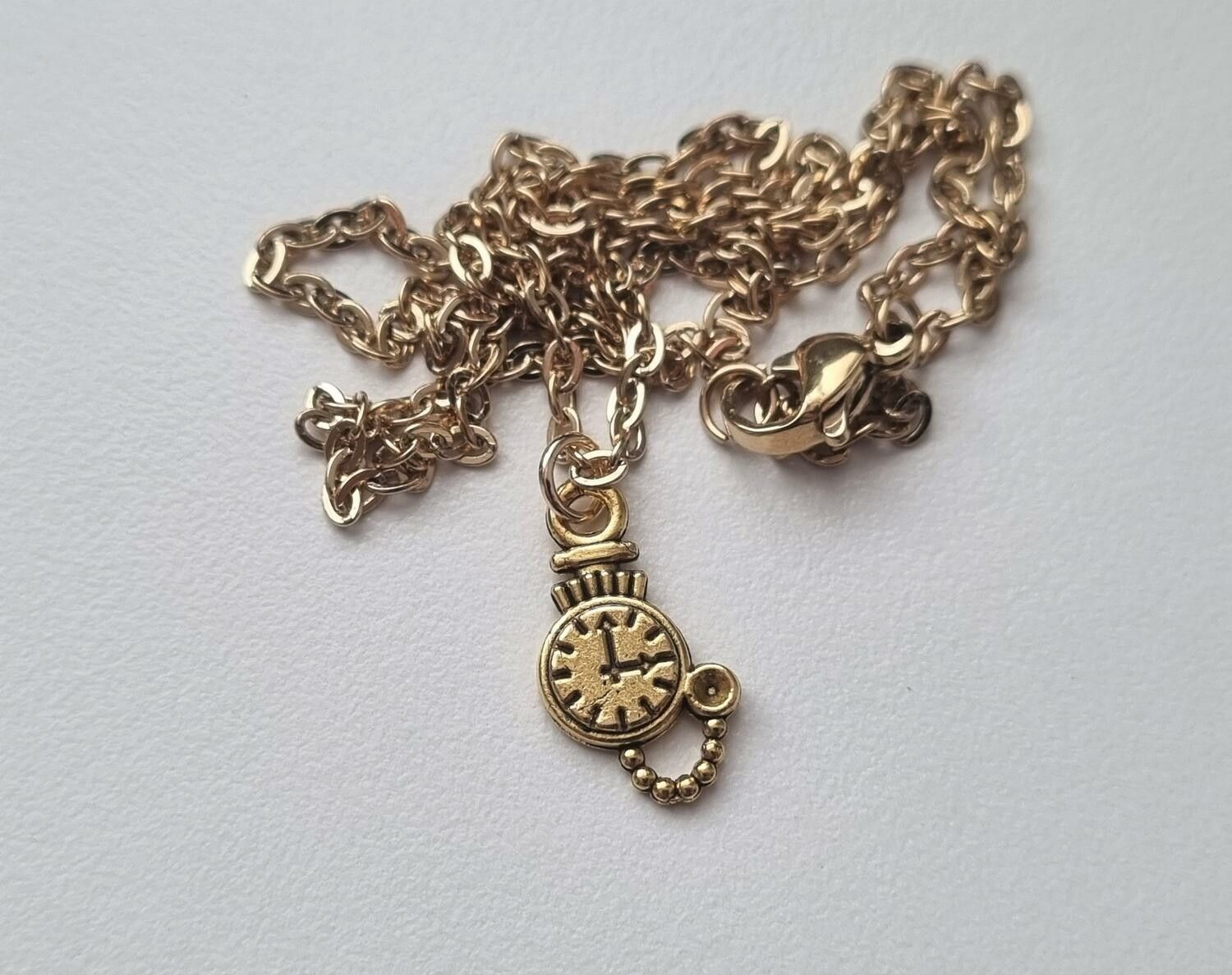 Halsband med klockberlock i steampunk (45 cm långt halsband)