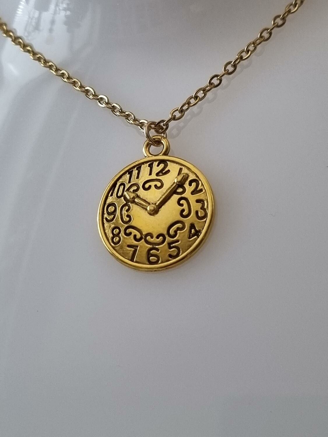 Halsband med klockberlock i steampunk (50 cm långt halsband)