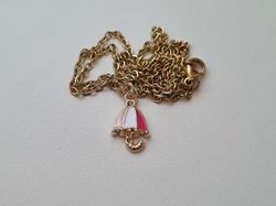 Guldfärgat halsband med ett paraply / paraplyberlock