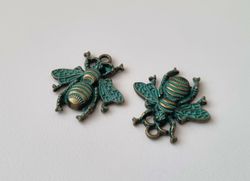 2 st berlocker Charms - Bin