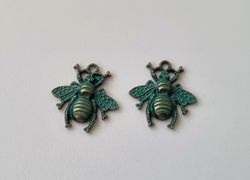 2 st berlocker Charms - Bin