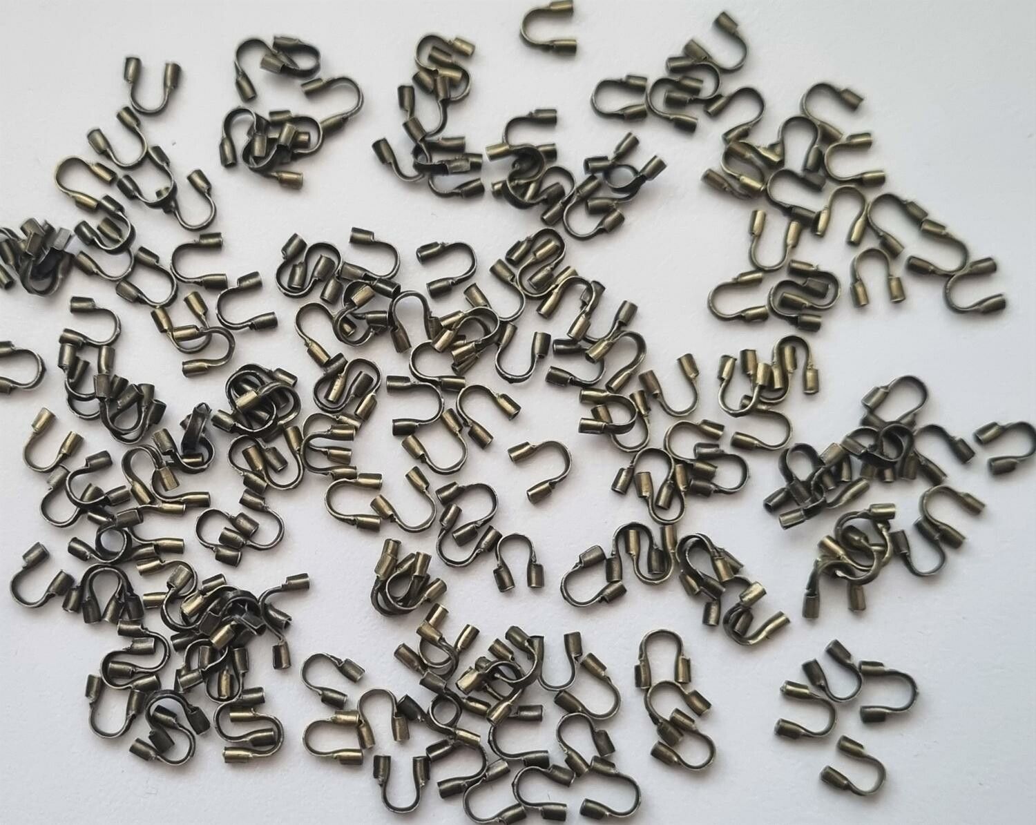 50 st bronsfärgade Wire guards, smyckestillbehör
