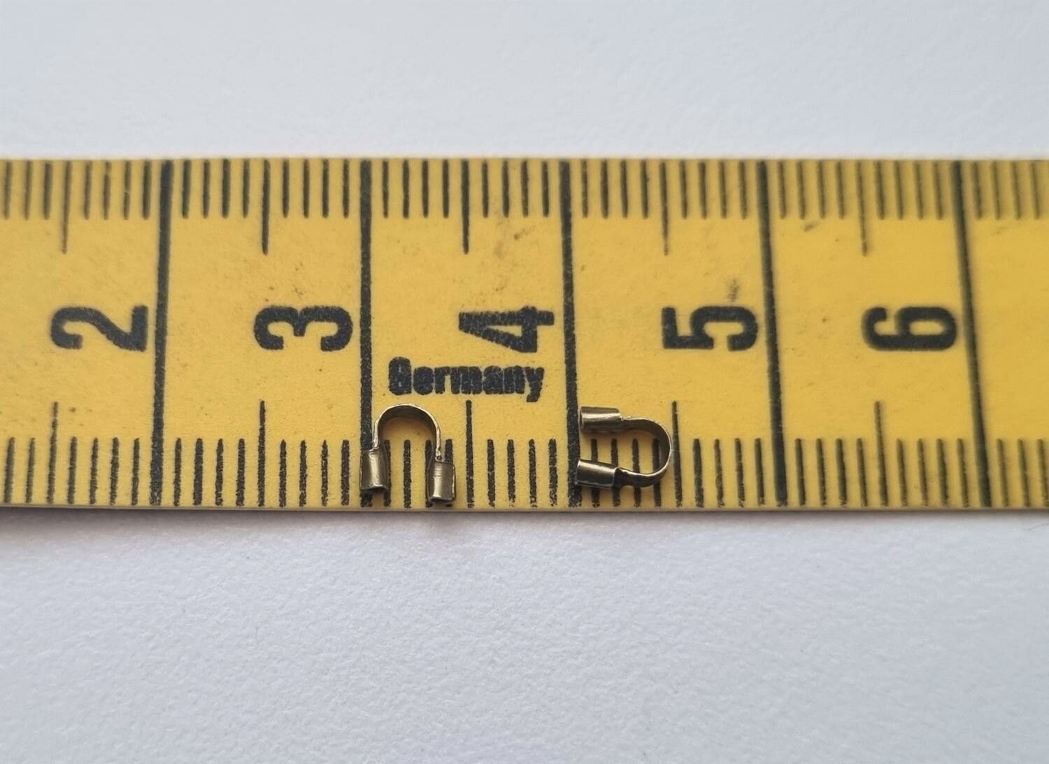 50 st bronsfärgade Wire guards, smyckestillbehör