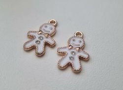 2 st pepparkaksgubbar hängen / berlocker / charms till smyckestillverkning