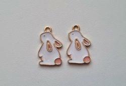 2 st kaniner, kaninberlocker / charms