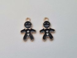 2 st pepparkaksgubbar hängen / berlocker / charms till smyckestillverkning