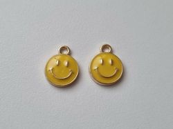 2 st gula smileys. Berlocker / charms för smyckestillverkning