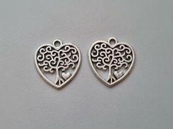 2 st silverfärgade träd, trädberlocker / charms