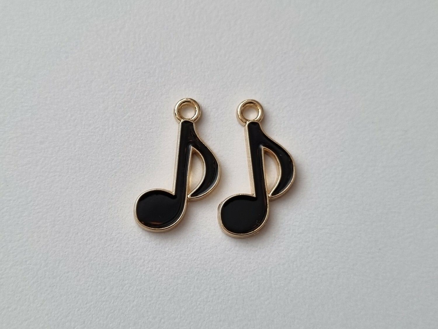 2 st svarta musiknoter. Berlocker / charms för smyckestillverkning
