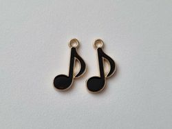 2 st svarta musiknoter. Berlocker / charms för smyckestillverkning