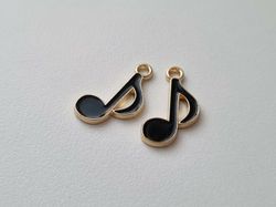 2 st svarta musiknoter. Berlocker / charms för smyckestillverkning