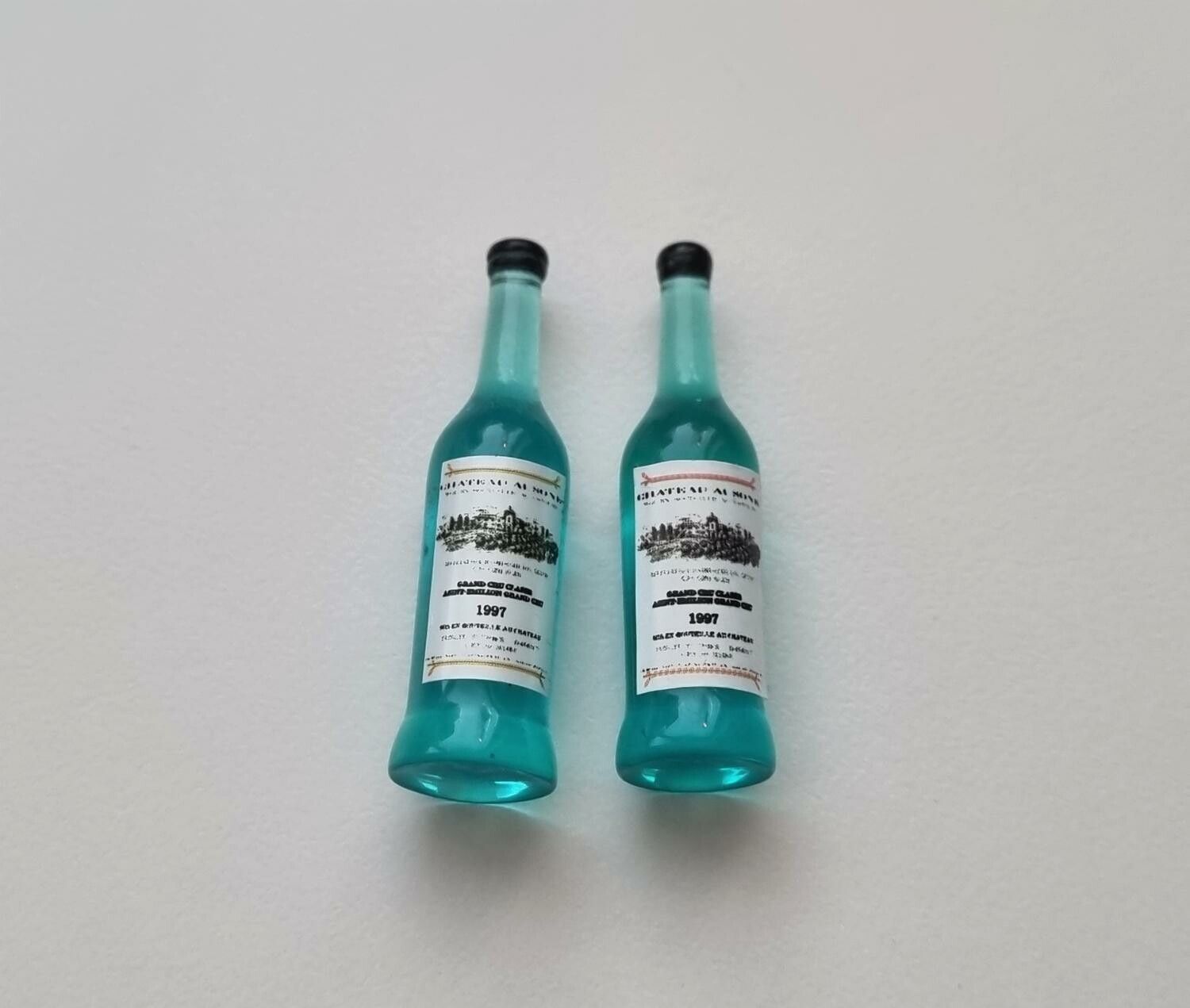 2 st miniatyrer, flaskor / miniflaskor till dockskåp, tittskåp (turkos)