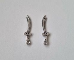 2 st små svärd / minisvärd. Berlocker / charms