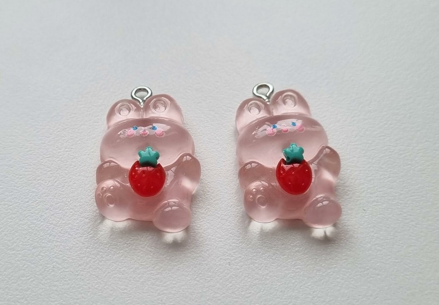 2 st rosa Nallar. Berlocker / hänge / charm