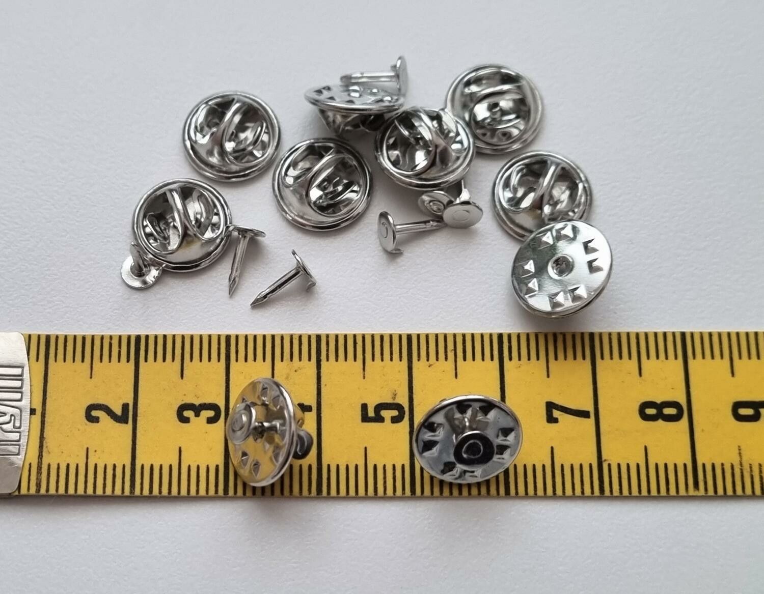 10 st silverfärgade fjärilslås / klämstift för att göra pins