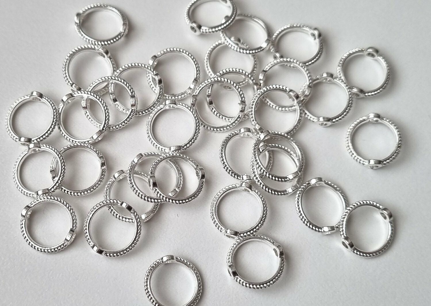 10 st connectors, ringar (silverfärgade)