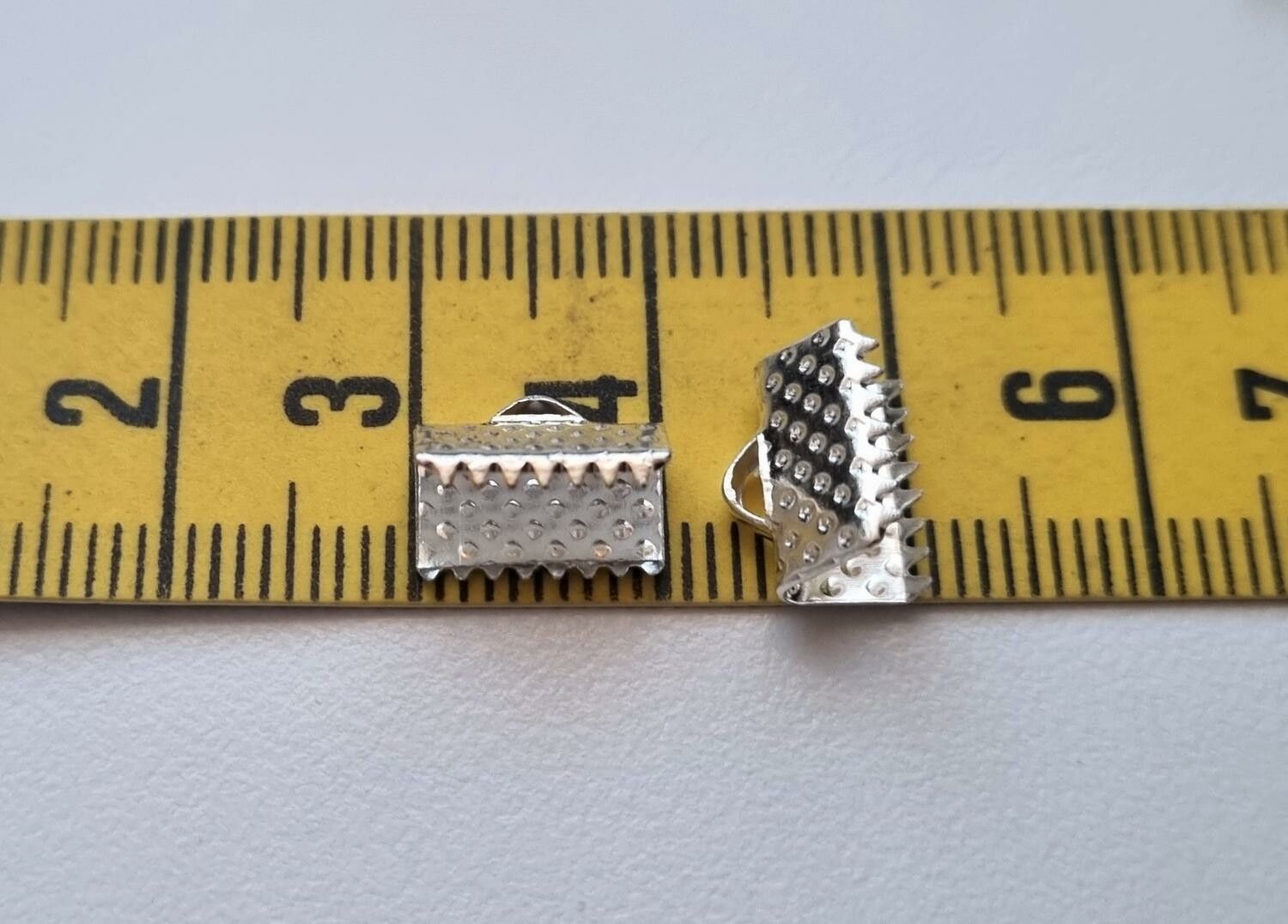 10 st silverfärgade lås klämmor (10 mm)